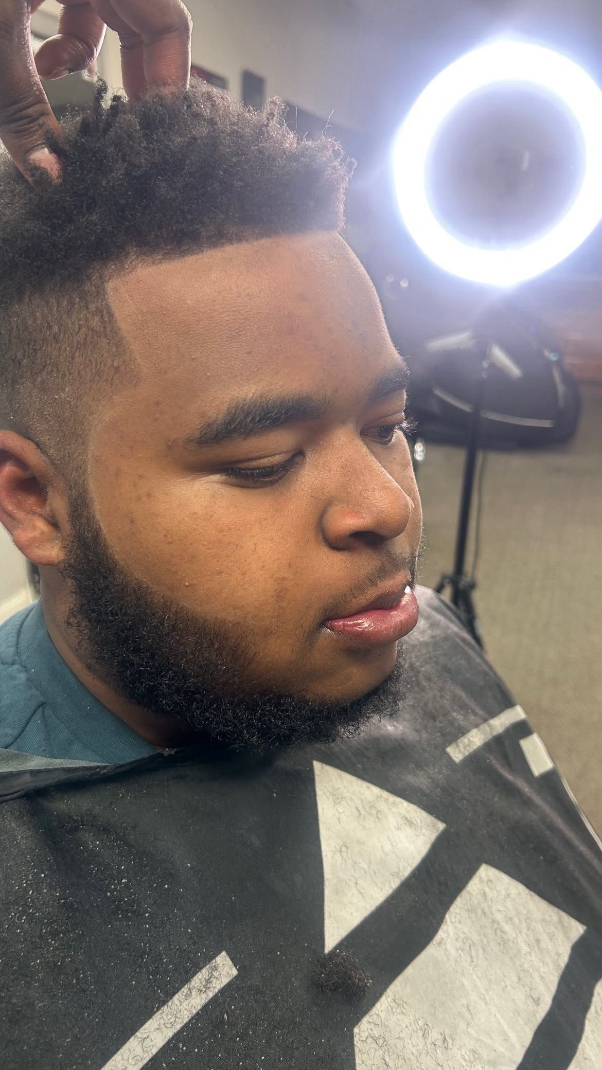 Sharp taper fade with defined hairline
