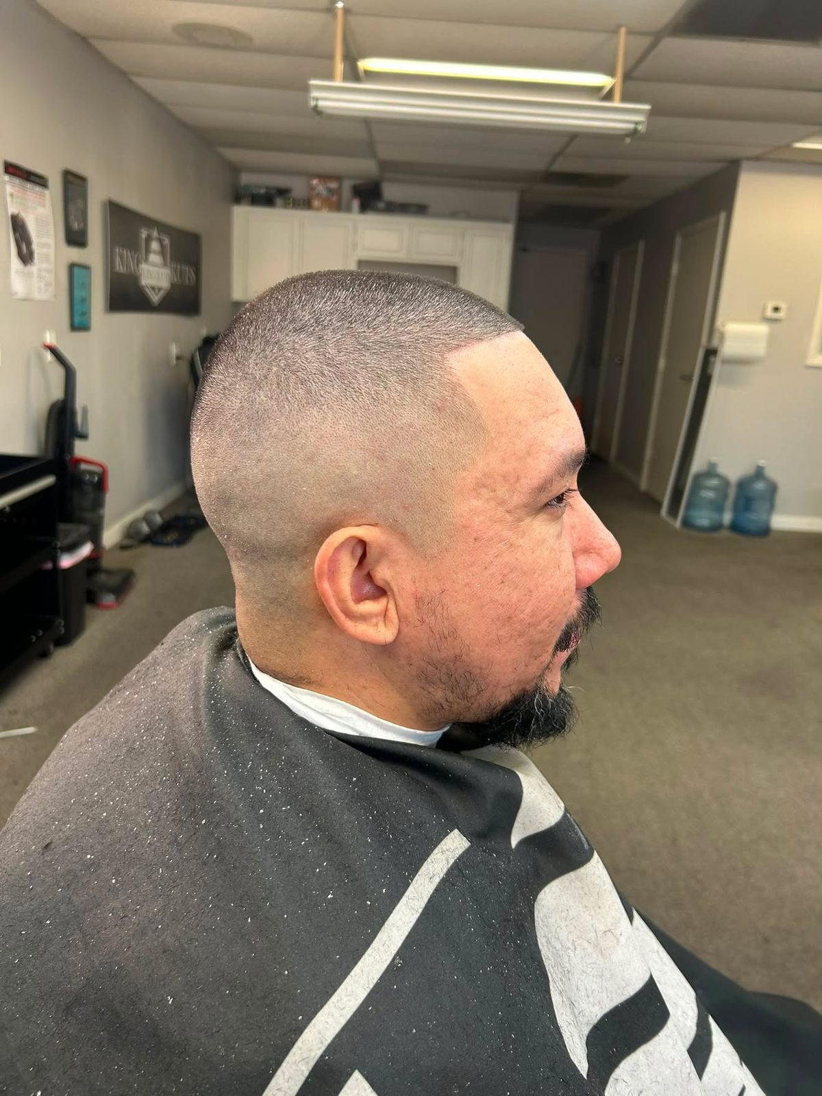 Bald fade with sharp part line